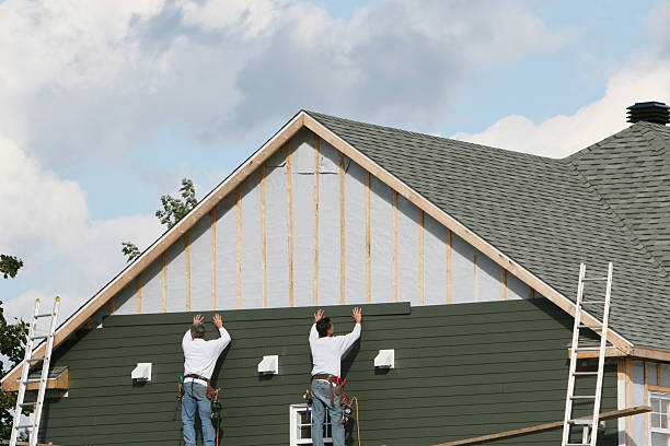 Professional Siding Installation technician working in Fredericksburg, TX